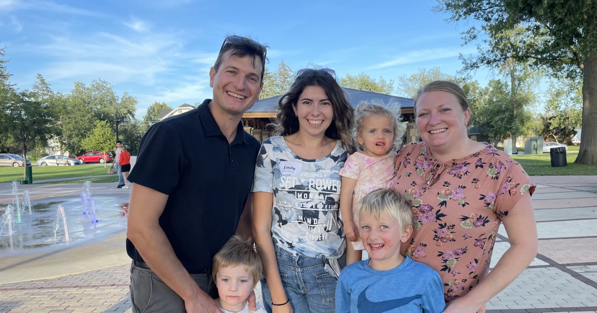 Family standing outstide